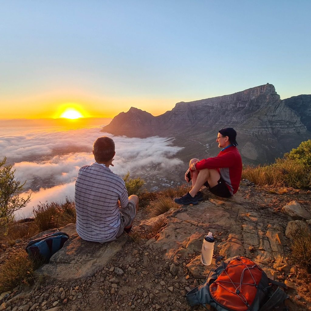 Hikers at sunrise on Table Mountain, Cape Town, South Africa